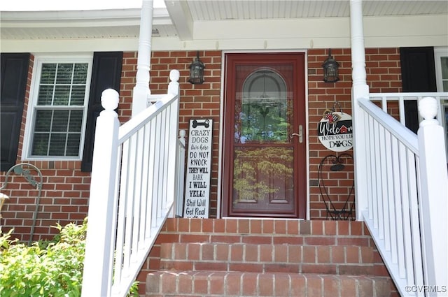 6197 Fishermans Way, Mechanicsville, VA 23116 - view of exterior entry with brick siding and covered porch