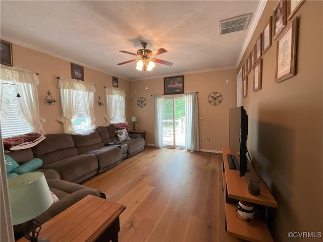 6197 Fishermans Way, Mechanicsville, VA 23116 - living room featuring ceiling fan, wood finished floors, and ornamental molding