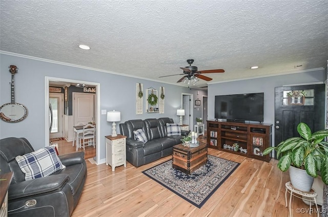 103 N Daisy Ave, Henrico, VA 23075 - living room with a ceiling fan, light wood-style flooring, a textured ceiling, crown molding, and recessed lighting
