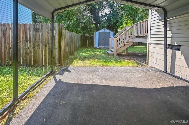 103 N Daisy Ave, Henrico, VA 23075 - view of yard featuring a patio area and a storage shed