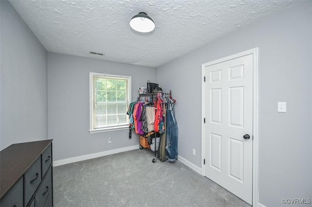 103 N Daisy Ave, Henrico, VA 23075 - carpeted bedroom featuring a textured ceiling and baseboards