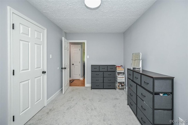 103 N Daisy Ave, Henrico, VA 23075 - bedroom with light carpet and a textured ceiling