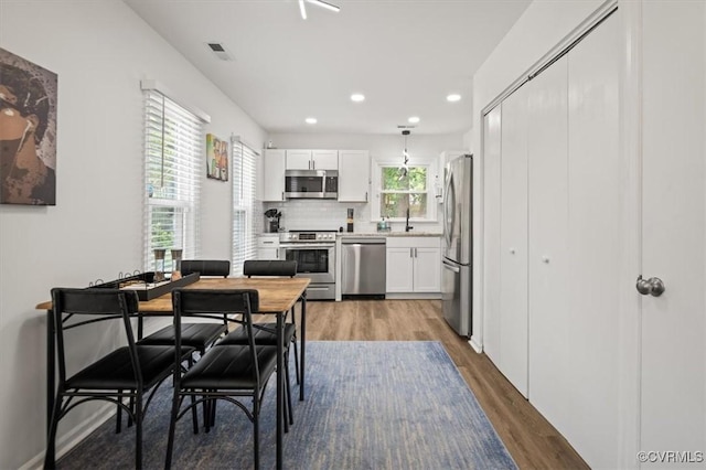 12305 Leesburg Cir, Midlothian, VA 23112 - dining room featuring light wood finished floors and recessed lighting