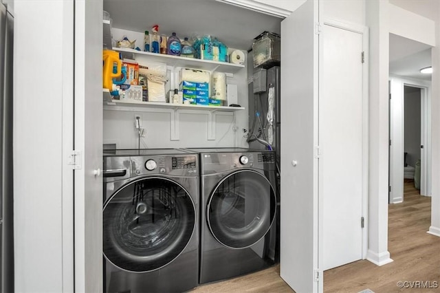 12305 Leesburg Cir, Midlothian, VA 23112 - laundry room featuring separate washer and dryer and wood finished floors