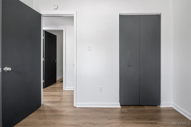12305 Leesburg Cir, Midlothian, VA 23112 - unfurnished bedroom featuring wood finished floors and a closet