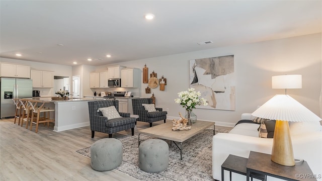 7000 Greenholm Pl, Chesterfield, VA 23234 - living area featuring light wood finished floors and recessed lighting