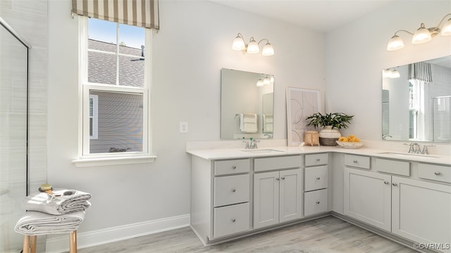 7000 Greenholm Pl, Chesterfield, VA 23234 - bathroom featuring wood finished floors and double vanity