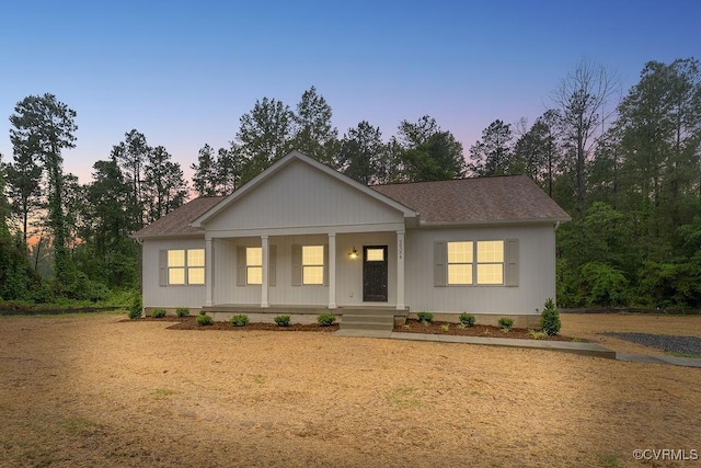 26354 Old Pitts, Ruther Glen, VA 22546 - view of front facade with a porch and a shingled roof