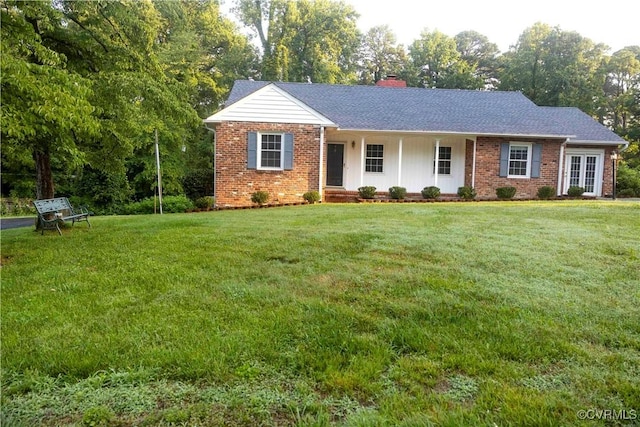 1208 Amesbury Ln, Richmond, VA 23227 - ranch-style home featuring brick siding, a front yard, and a chimney