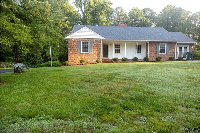 1208 Amesbury Ln, Richmond, VA 23227 - ranch-style home featuring brick siding, a chimney, and a front lawn