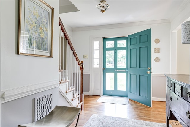105 Williamson Ct, Henrico, VA 23229 - entrance foyer with stairs, light wood finished floors, and ornamental molding