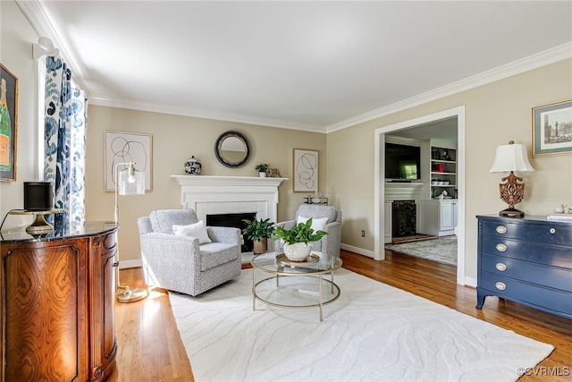 105 Williamson Ct, Henrico, VA 23229 - living area featuring a fireplace, ornamental molding, and wood finished floors