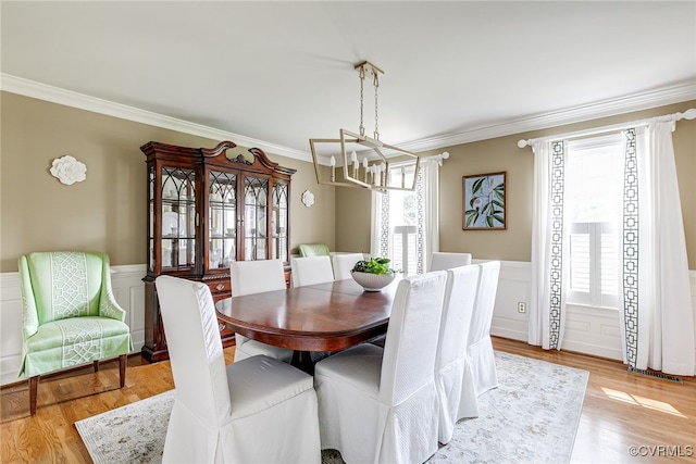 105 Williamson Ct, Henrico, VA 23229 - dining space with a chandelier, plenty of natural light, crown molding, a wainscoted wall, and light wood-type flooring