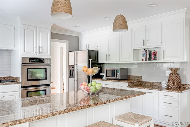 105 Williamson Ct, Henrico, VA 23229 - kitchen with stainless steel appliances, white cabinetry, tasteful backsplash, crown molding, and recessed lighting