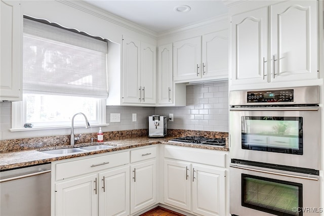 105 Williamson Ct, Henrico, VA 23229 - kitchen with stainless steel appliances, white cabinets, and ornamental molding