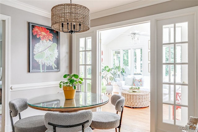105 Williamson Ct, Henrico, VA 23229 - dining area with wood finished floors, a chandelier, and crown molding