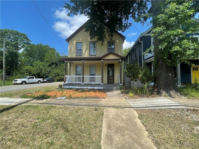 319 W 27th St, Richmond, VA 23225 - view of front of house featuring covered porch