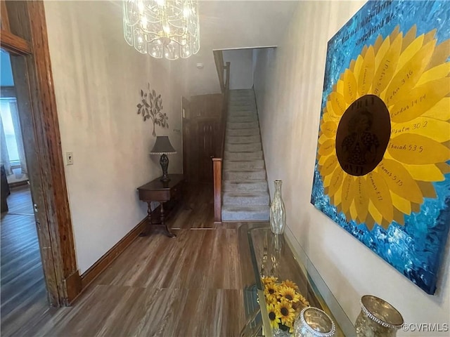 319 W 27th St, Richmond, VA 23225 - stairway featuring a chandelier and wood finished floors