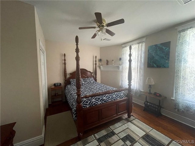 319 W 27th St, Richmond, VA 23225 - bedroom featuring wood finished floors, multiple windows, and a ceiling fan