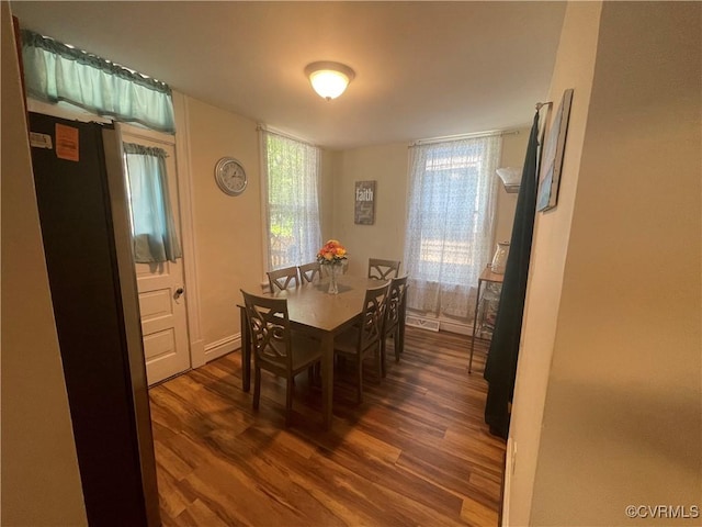 319 W 27th St, Richmond, VA 23225 - dining space featuring dark wood-style floors