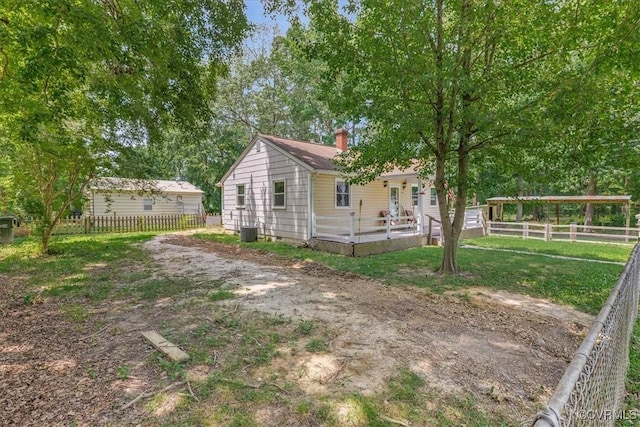 3614 Madison St, Prince George, VA 23860 - view of home's exterior featuring a chimney and a central air condition unit