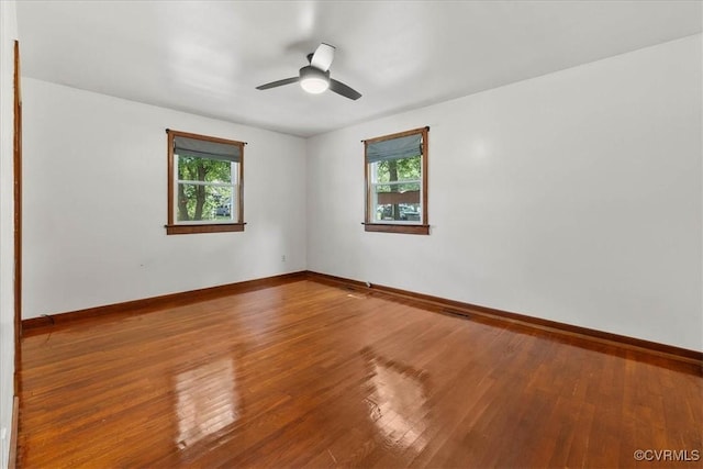 3614 Madison St, Prince George, VA 23860 - unfurnished room featuring plenty of natural light, hardwood / wood-style floors, and ceiling fan
