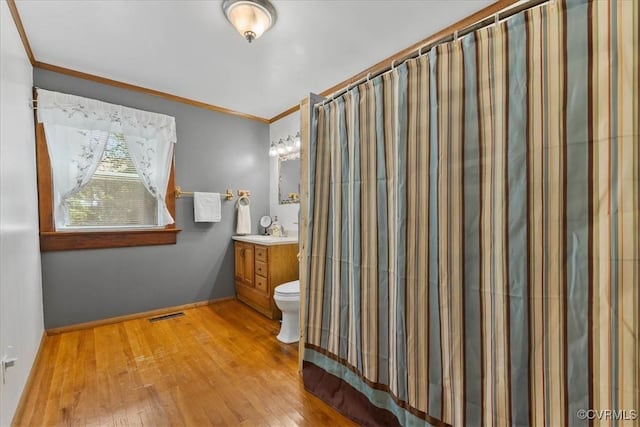 3614 Madison St, Prince George, VA 23860 - full bath featuring vanity, hardwood / wood-style flooring, crown molding, and curtained shower