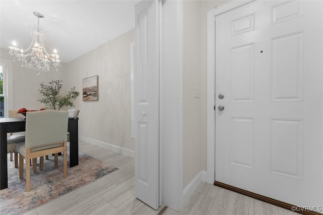 5239 Old Buckingham Rd, Powhatan, VA 23139 - dining space with a chandelier and light wood-style flooring