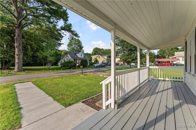 4309 2nd St, Henrico, VA 23223 - wooden porch featuring a lawn