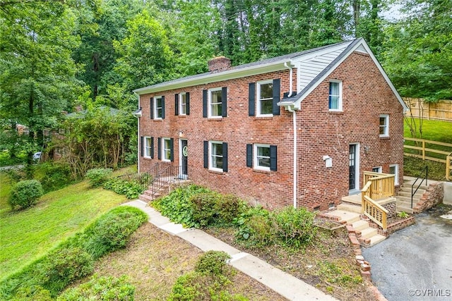 8101 Lake Shore Dr, North Chesterfield, VA 23235 - view of front of home featuring a chimney and brick siding