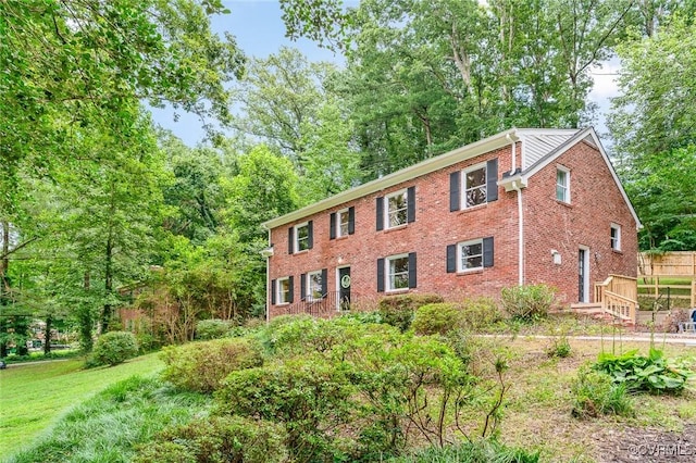 8101 Lake Shore Dr, North Chesterfield, VA 23235 - view of front of home with brick siding and view of wooded area