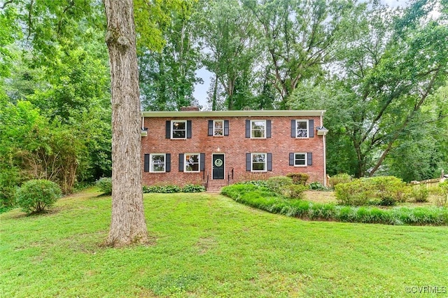 8101 Lake Shore Dr, North Chesterfield, VA 23235 - colonial inspired home with a front yard and brick siding