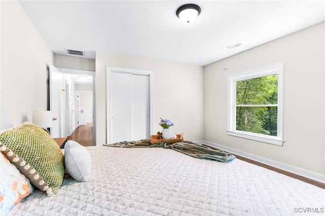 8101 Lake Shore Dr, North Chesterfield, VA 23235 - bedroom with a closet and wood finished floors