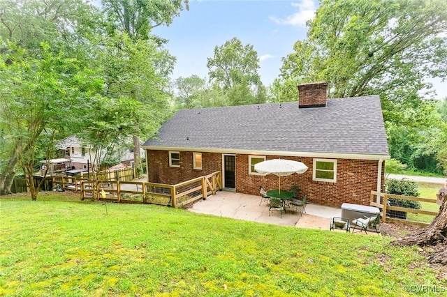 8101 Lake Shore Dr, North Chesterfield, VA 23235 - back of house featuring a chimney, a patio area, brick siding, and a shingled roof