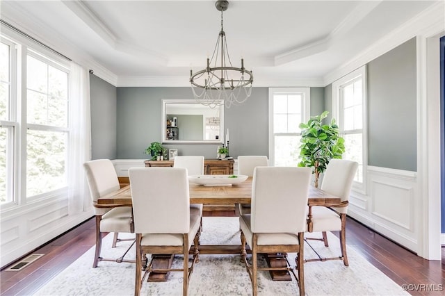 1240 Miners Trail Rd, Midlothian, VA 23114 - dining space with a raised ceiling, a chandelier, crown molding, hardwood / wood-style floors, and wainscoting