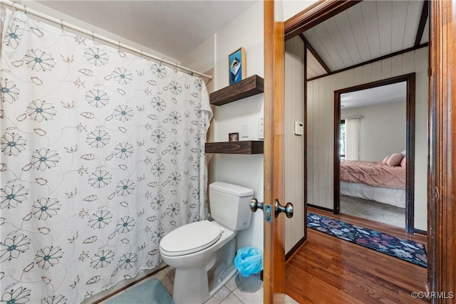 6131 Kellys Gln, Mineral, VA 23117 - bathroom with ensuite bathroom, wood finished floors, curtained shower, and wood walls