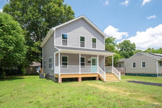 2227 S Whitehill Dr, Petersburg, VA 23803 - view of front facade featuring covered porch and a front yard