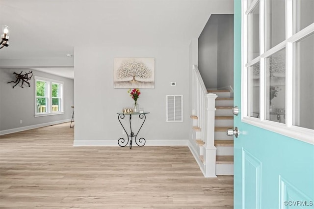 2227 S Whitehill Dr, Petersburg, VA 23803 - entryway featuring stairs and light wood finished floors