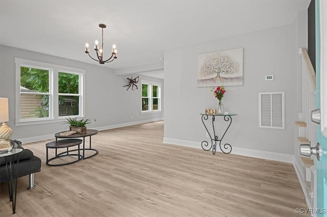 2227 S Whitehill Dr, Petersburg, VA 23803 - sitting room featuring a chandelier and light wood-style flooring