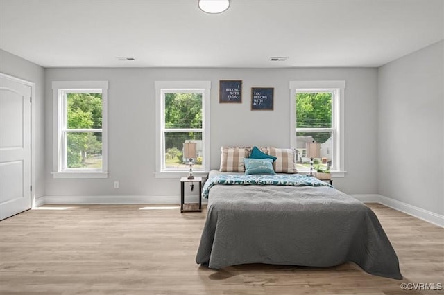 2227 S Whitehill Dr, Petersburg, VA 23803 - bedroom with wood finished floors and baseboards