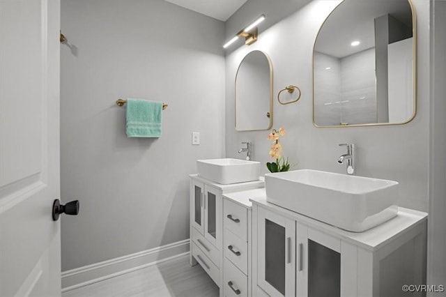 2227 S Whitehill Dr, Petersburg, VA 23803 - full bath featuring vanity and baseboards