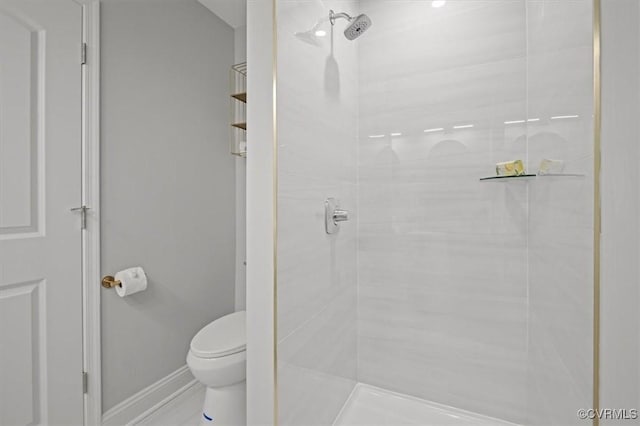 2227 S Whitehill Dr, Petersburg, VA 23803 - bathroom featuring a tile shower and toilet