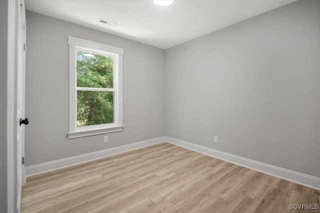 2227 S Whitehill Dr, Petersburg, VA 23803 - unfurnished room with light wood-style flooring and baseboards