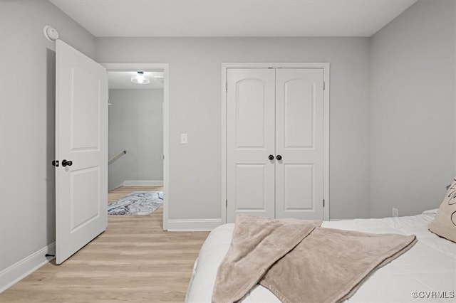 2227 S Whitehill Dr, Petersburg, VA 23803 - bedroom featuring a closet and light wood-style floors