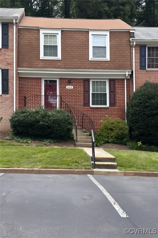 1516 Professor Ct, Henrico, VA 23228 - view of front facade with brick siding and uncovered parking