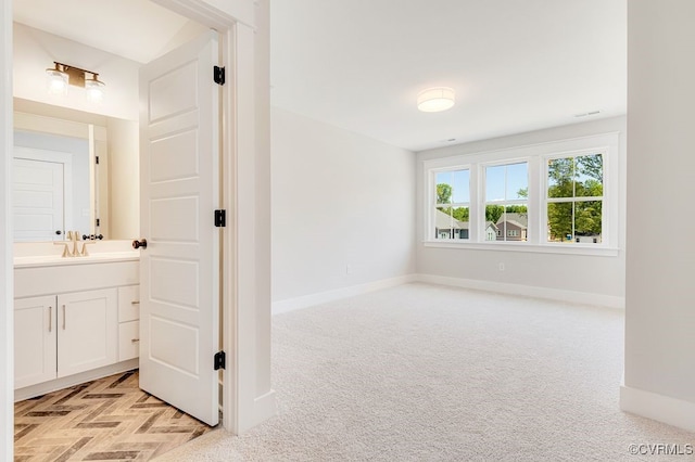 9157 Terroir Ln, New Kent, VA 23124 - corridor featuring baseboards and light carpet