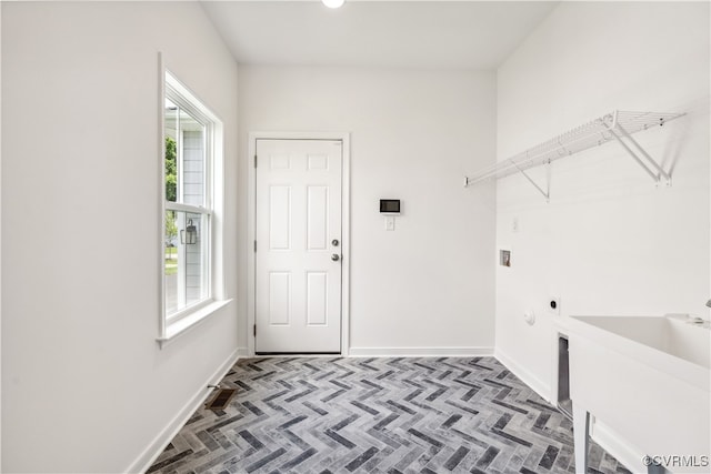 9130 Terroir Ln, New Kent, VA 23124 - laundry room featuring electric dryer hookup and baseboards