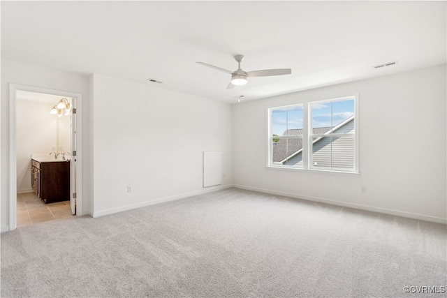 9130 Terroir Ln, New Kent, VA 23124 - unfurnished room with light carpet and a ceiling fan