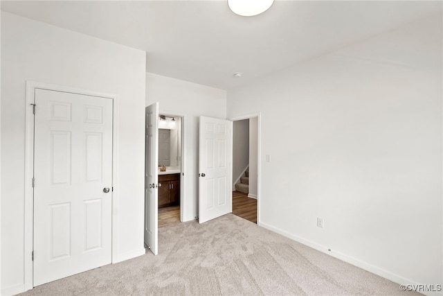 9131 Terroir Ln, New Kent, VA 23124 - unfurnished bedroom featuring light carpet and baseboards