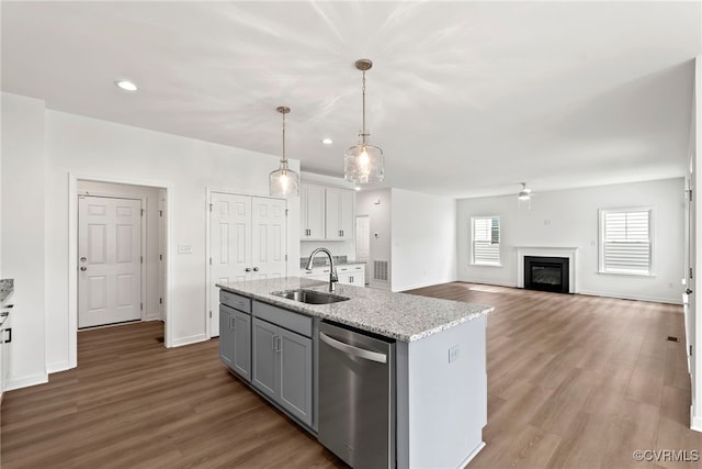 9131 Terroir Ln, New Kent, VA 23124 - kitchen with dishwasher, gray cabinetry, wood finished floors, recessed lighting, and a kitchen island with sink